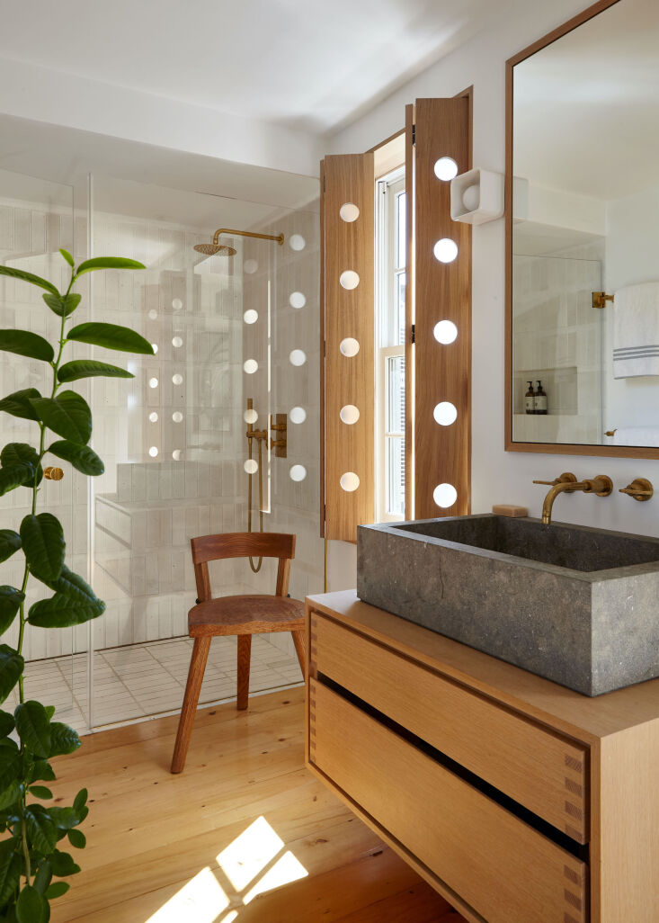 the hole punched shutters are designed by matt after a jean prouvé door design 18