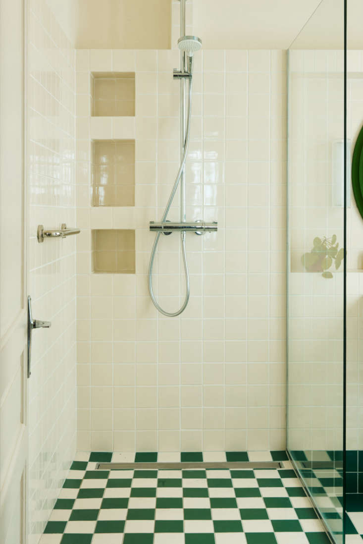 the glass shower is thoughtfully detailed with tiled niches. 27