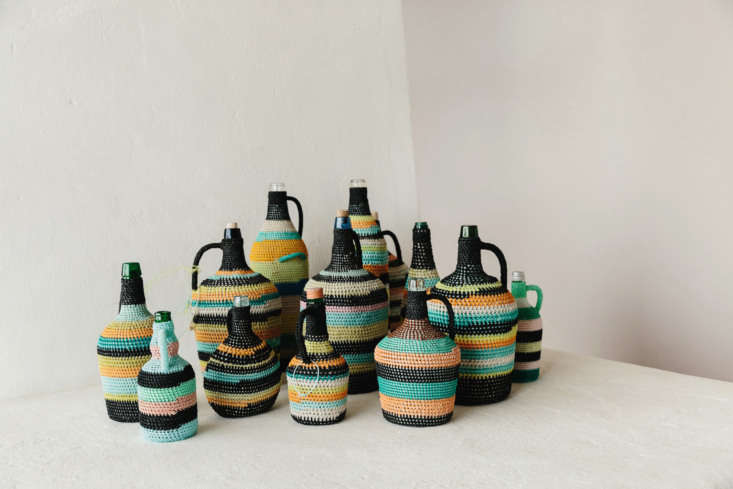 glass bottles are encased in colorful crochet, casa modesta offers workshops on 21