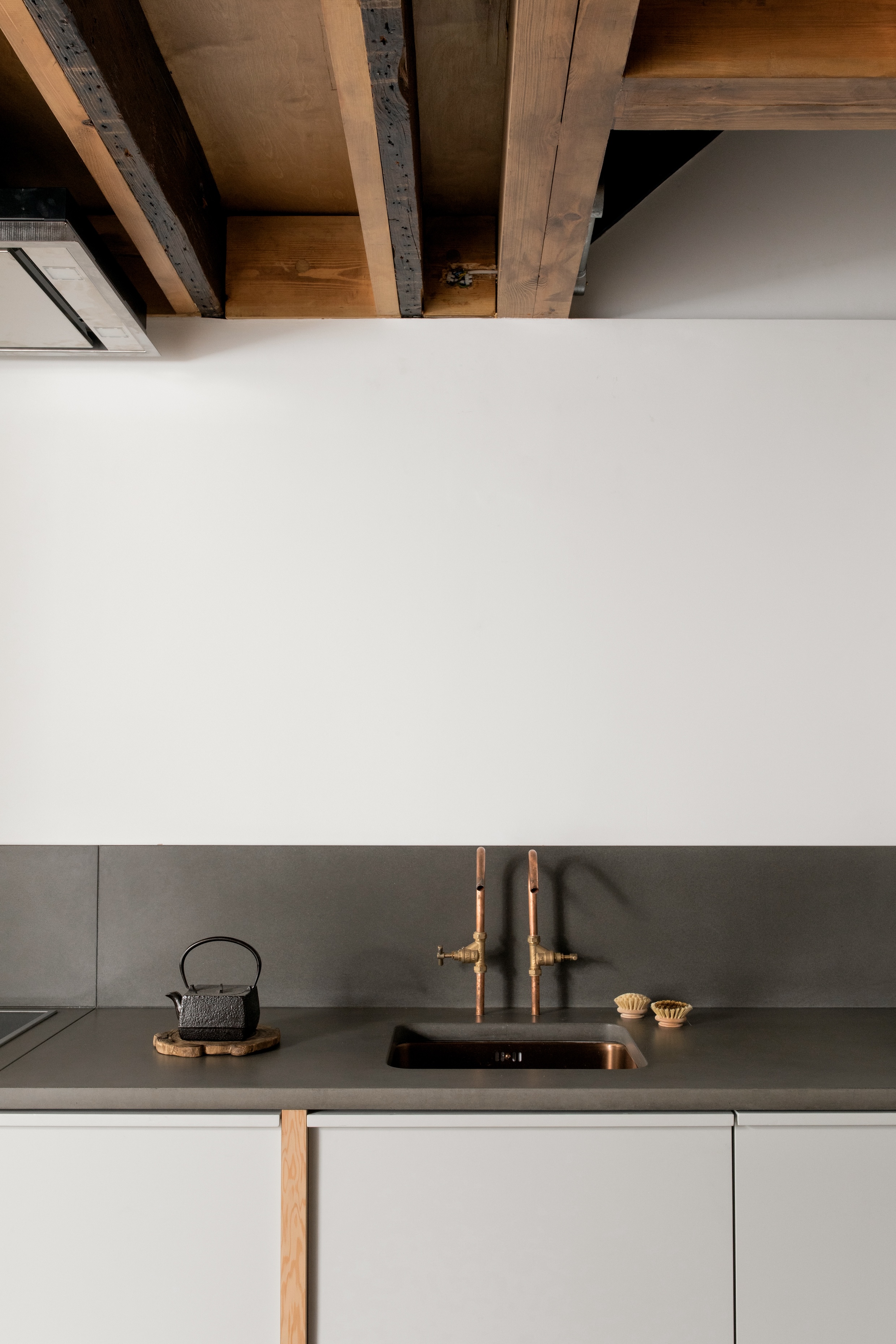 the sink faucets are made from copper piping. note the combination of old and n 23