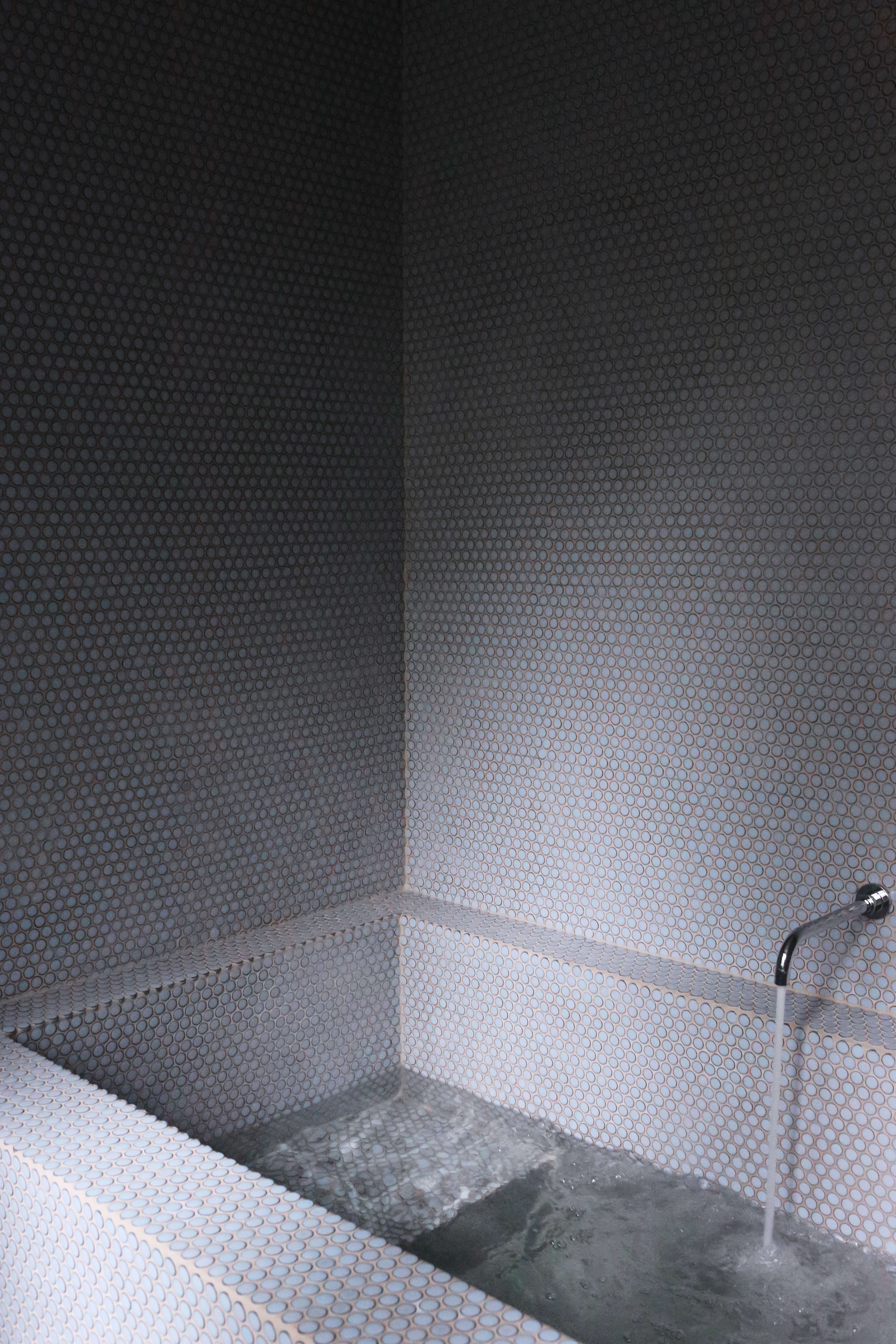tiled plunge pool bathtub at jackie winter gardens, a guesthouse and artist res 27