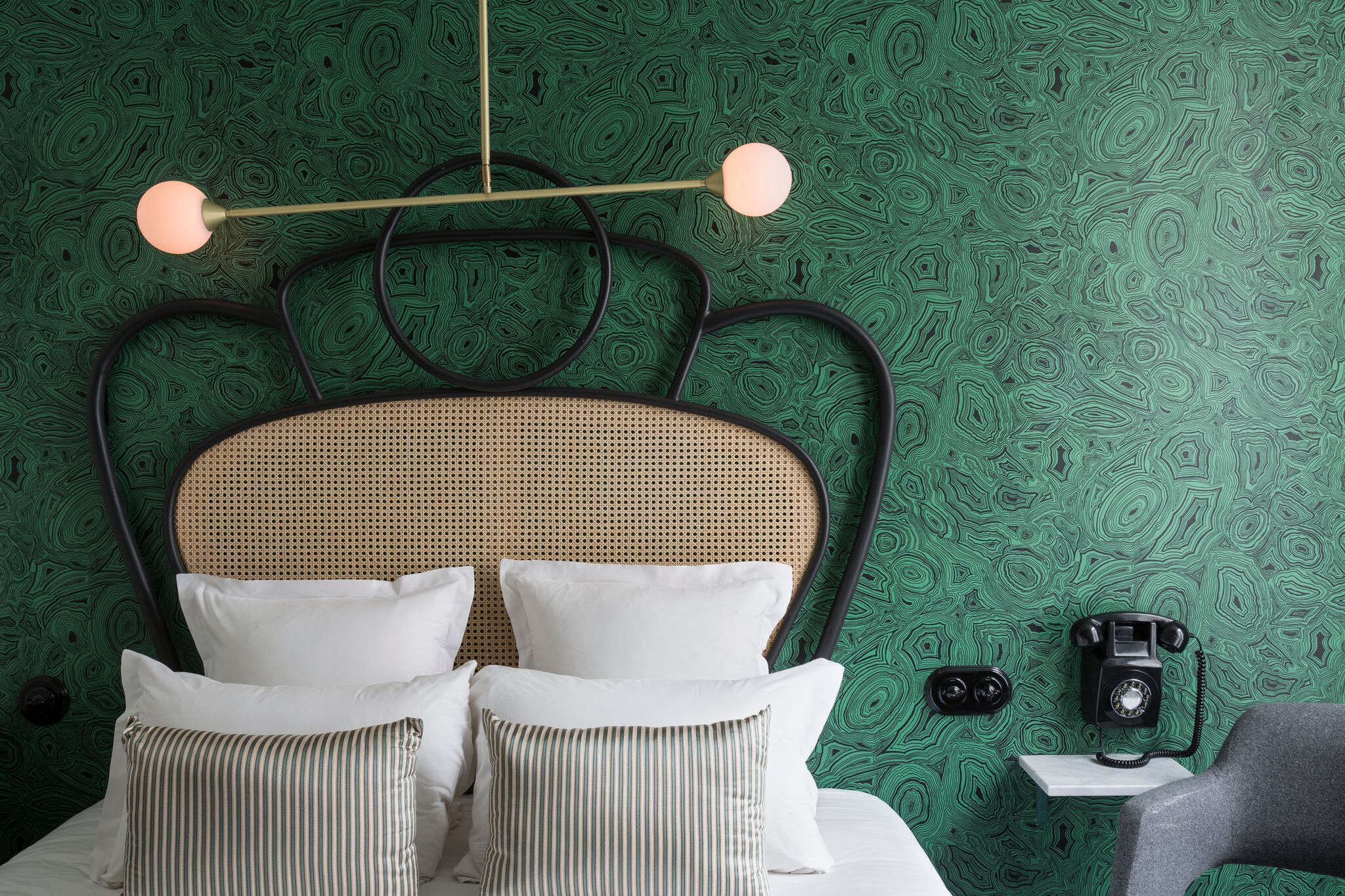 the malachite wallpaper is a fornasetti pattern from cole & son. the in hou 24