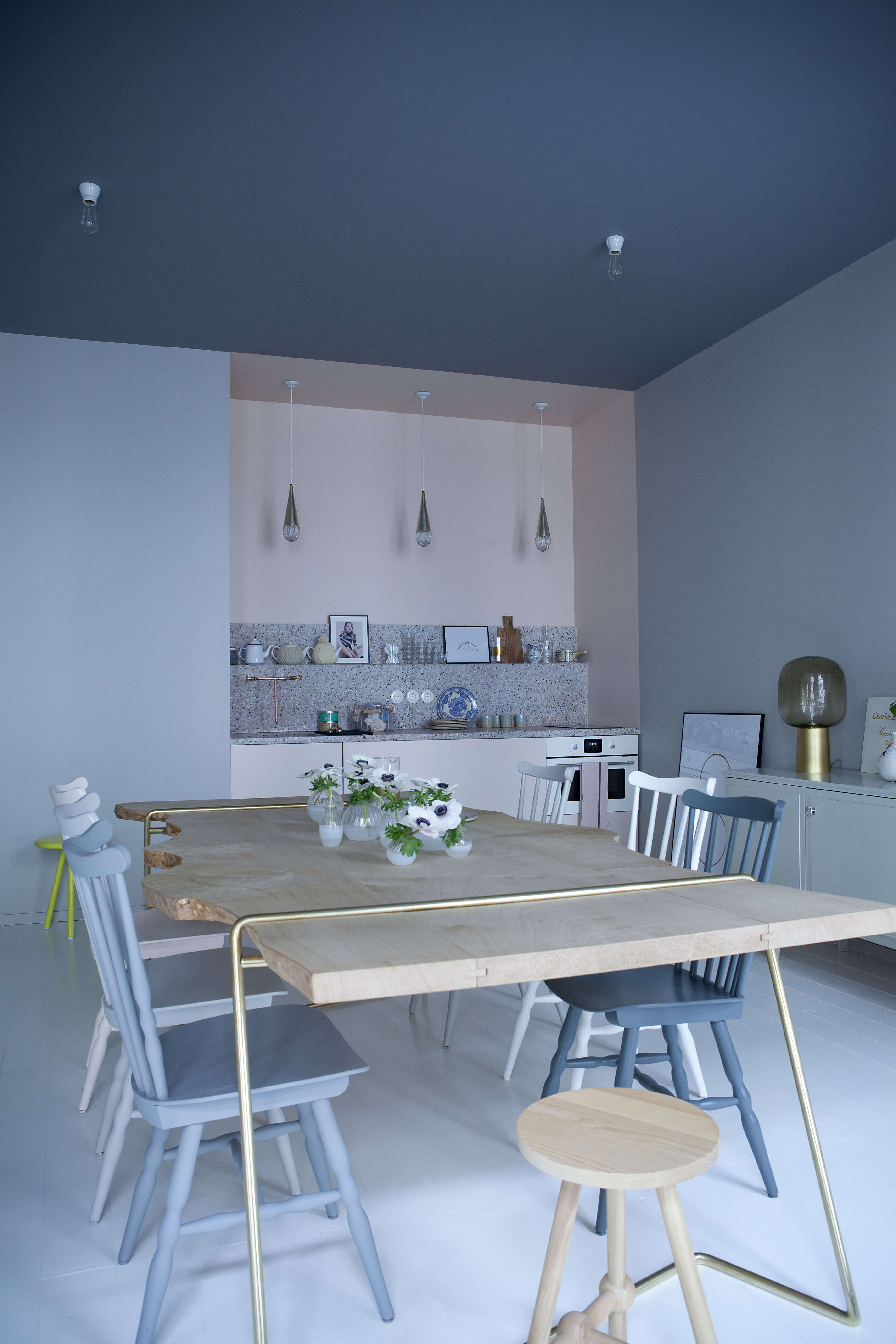 the compact kitchen with terrazzo counters at chez marie sixtine, a guest apart 17