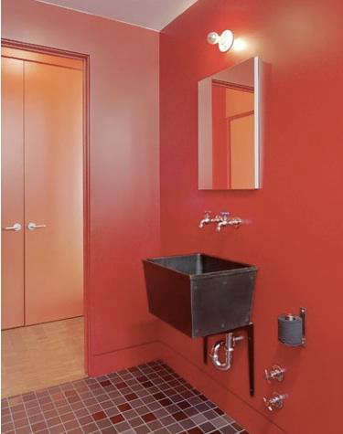 envelopead bath red walls industrial