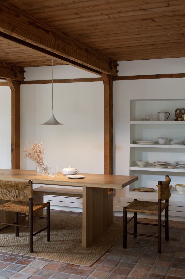 the dining table was made by local furniture maker don howell and the chairs ar 21