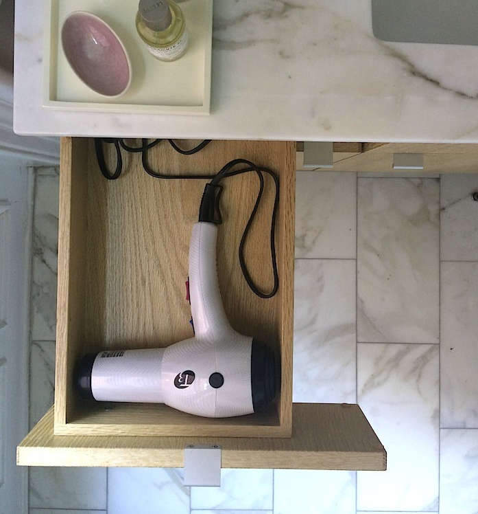 outlets installed at the back of bathroom drawers are convenient for hidden hai 21