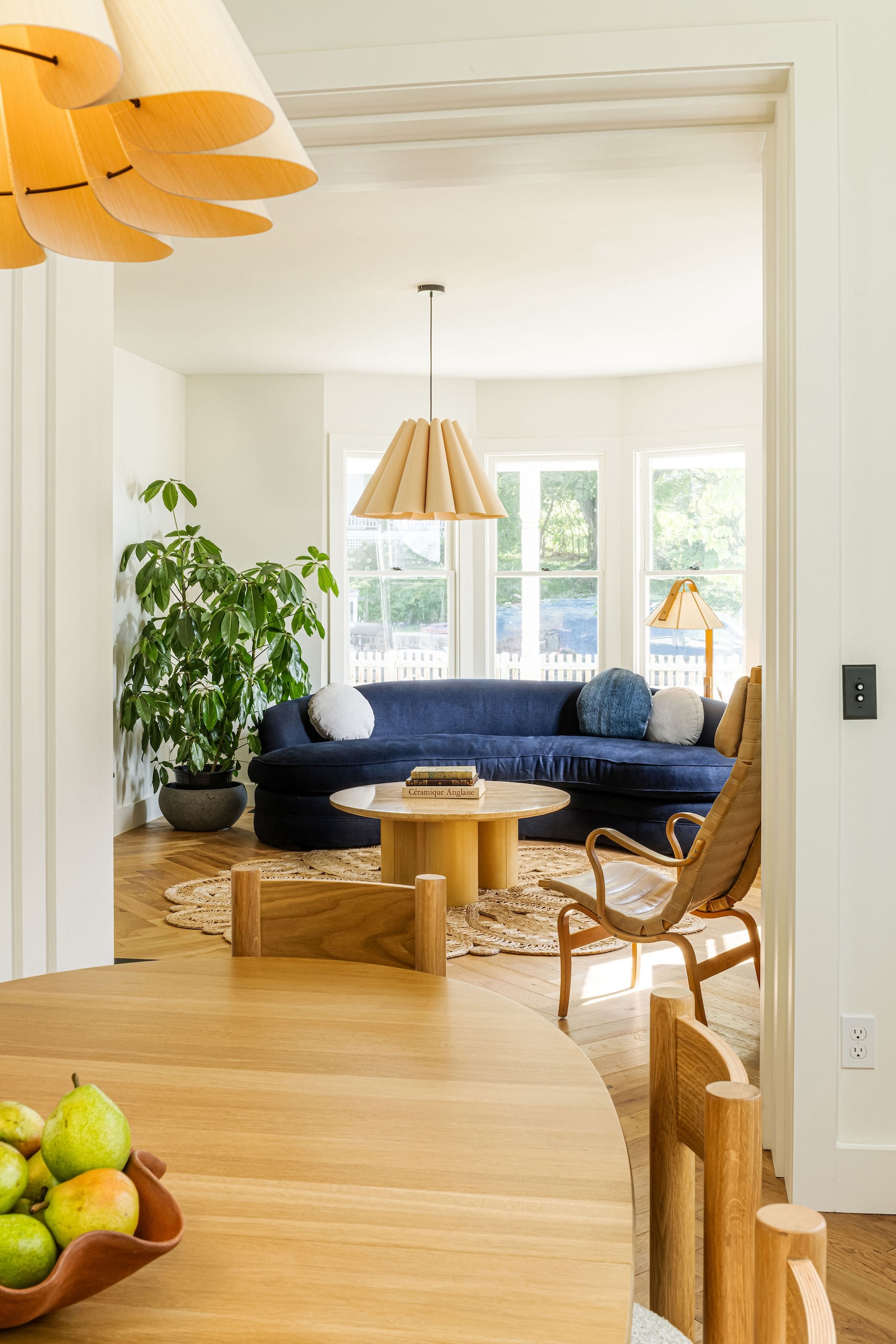 the dining room and parlor both have lora pendants of scalloped recycled wood b 23