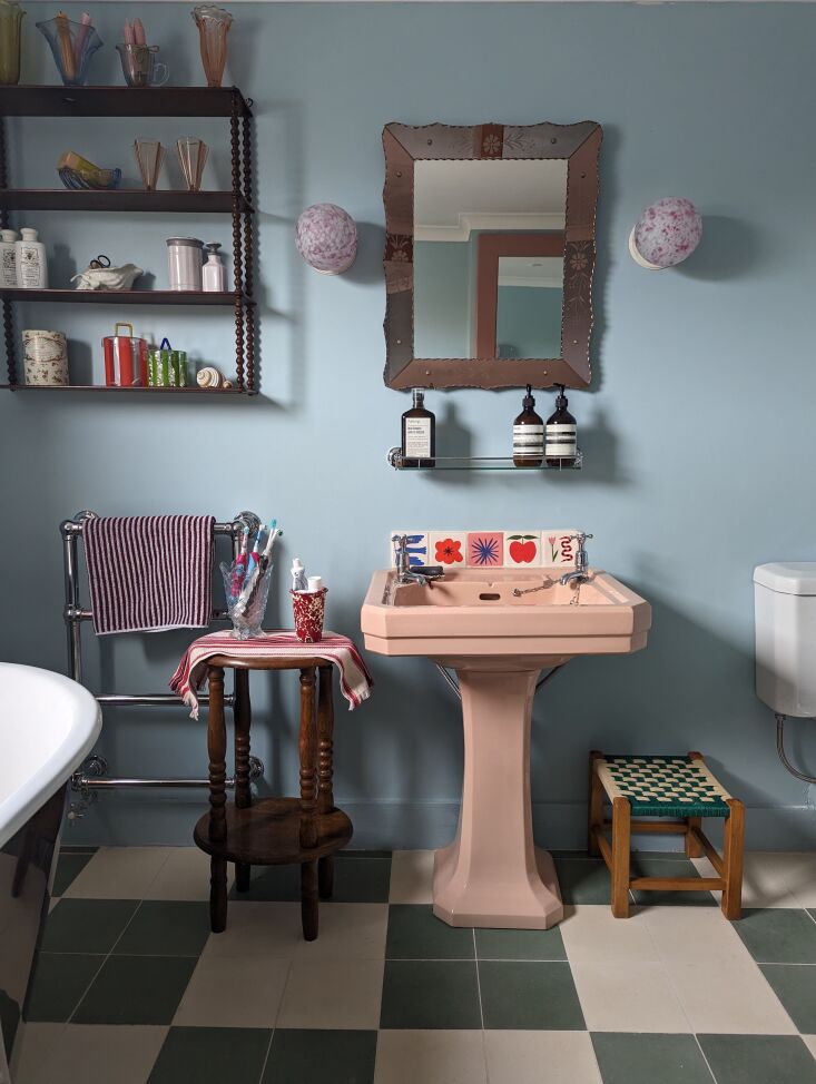 the design started with the statement vintage pink pedestal sink, followed up b 17