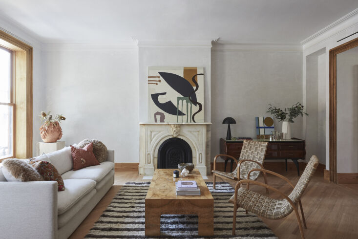 the architects restored the living room to its original dimensions and preserve 18