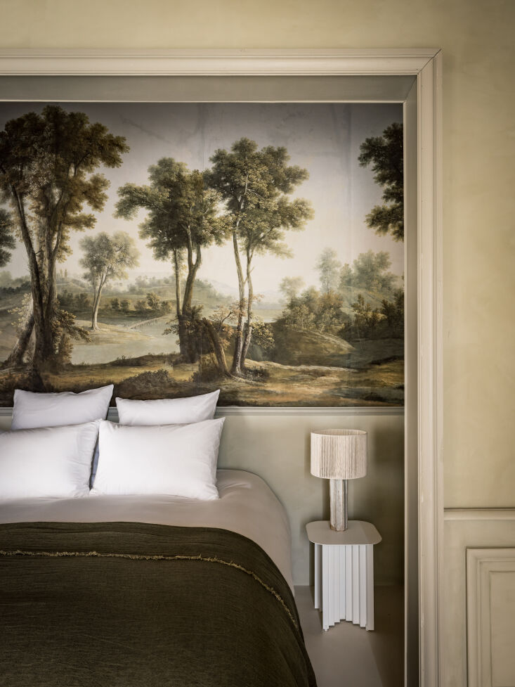 a closer look at the sleeping space in the “jardin” suite, with panoramic w 20