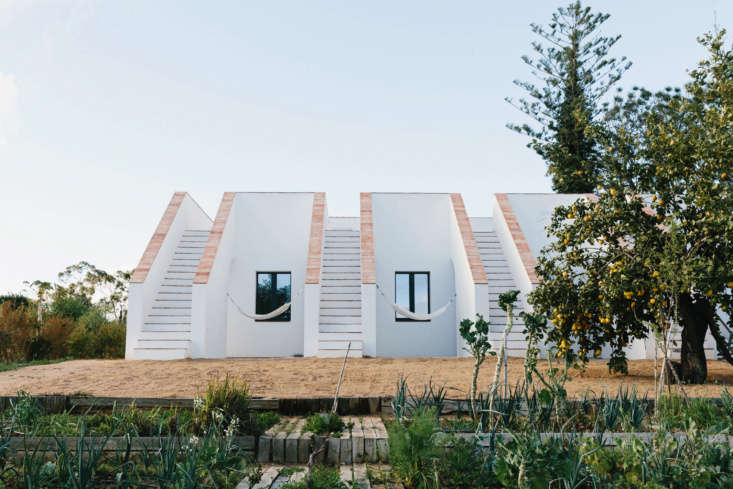 the long house has nine guest rooms, each with its own private patio. 17