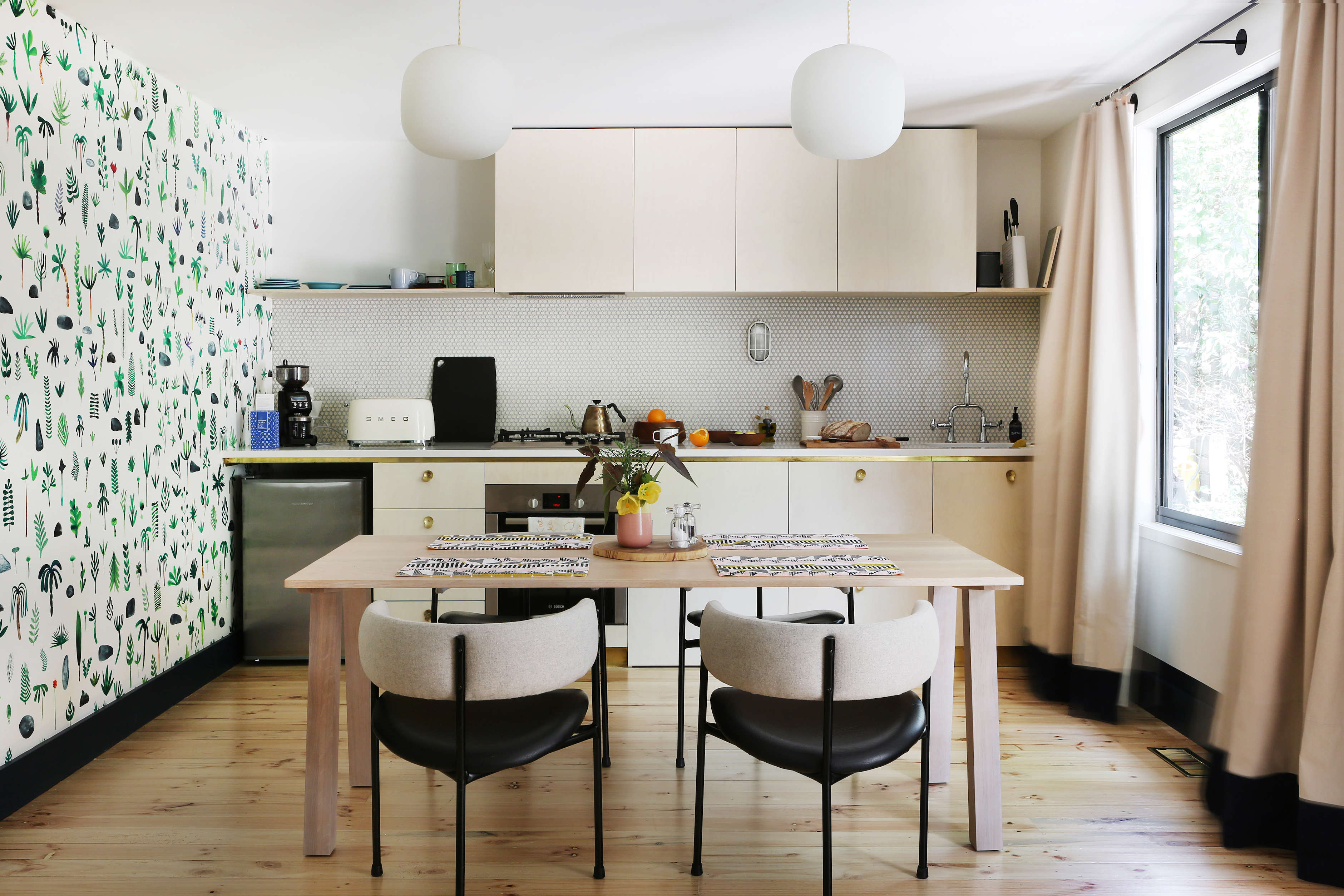 the wallpapered modern kitchen at jackie winter gardens, a guesthouse and artis 18