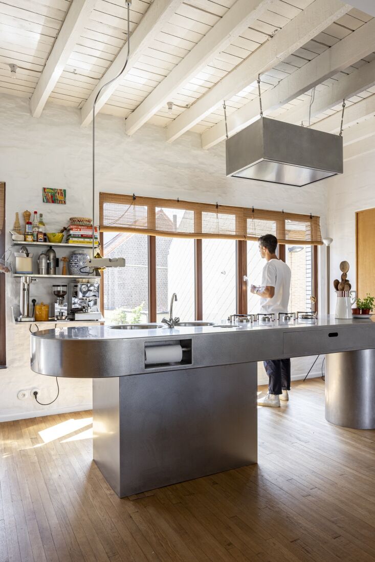 a stove, microwave, and dishwasher are incorporated into the hidden far side of 28