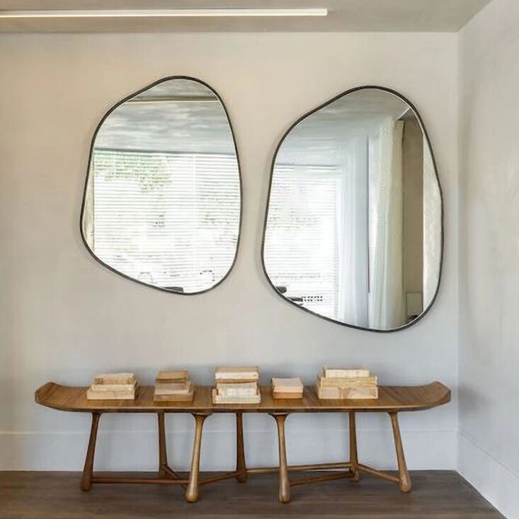 the aes irregular mirror comes in four sizes, starting \$\299.89 for 70 by 90 c 17