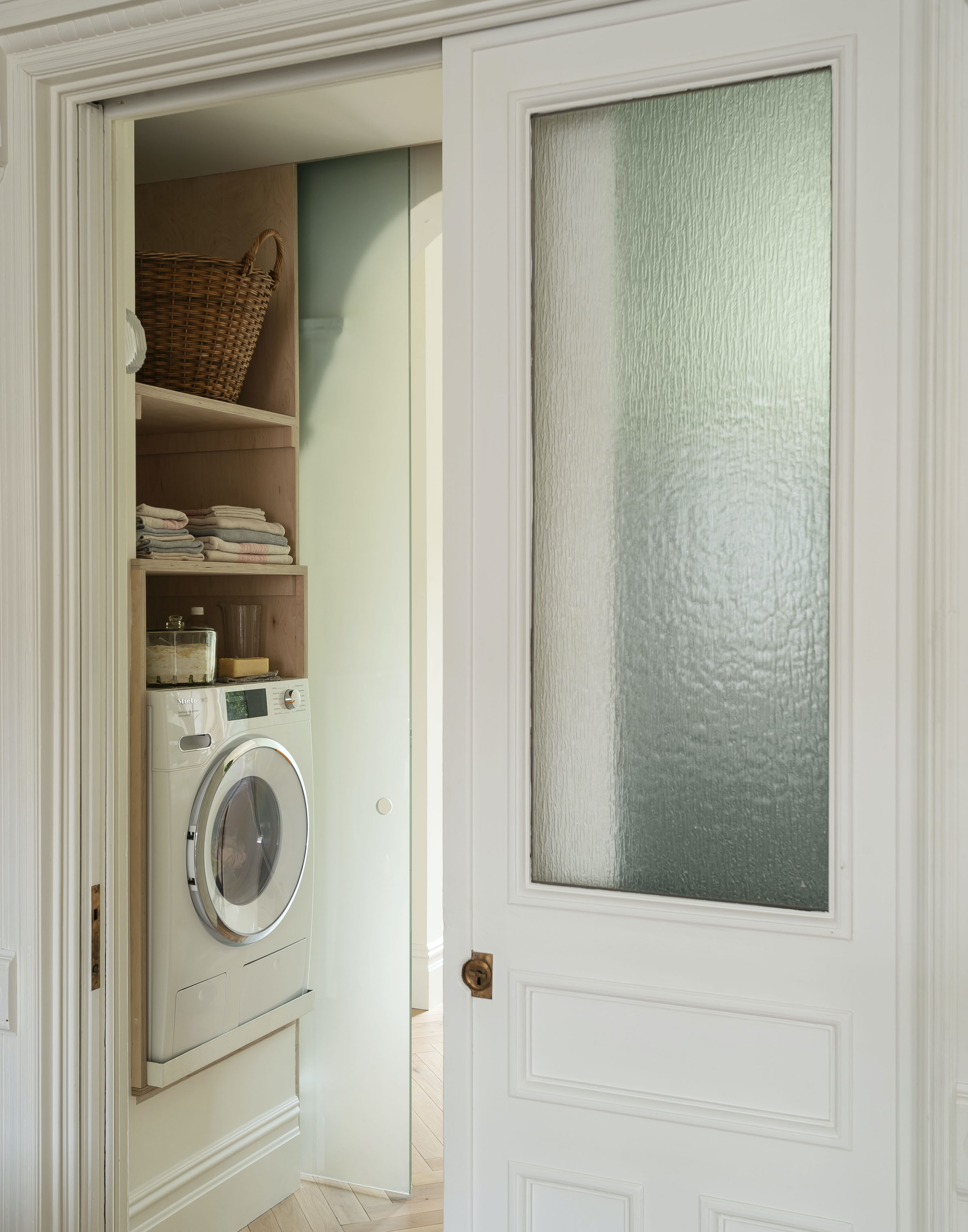 the architects fit the laundry and powder room into \2\20;what was previ 20
