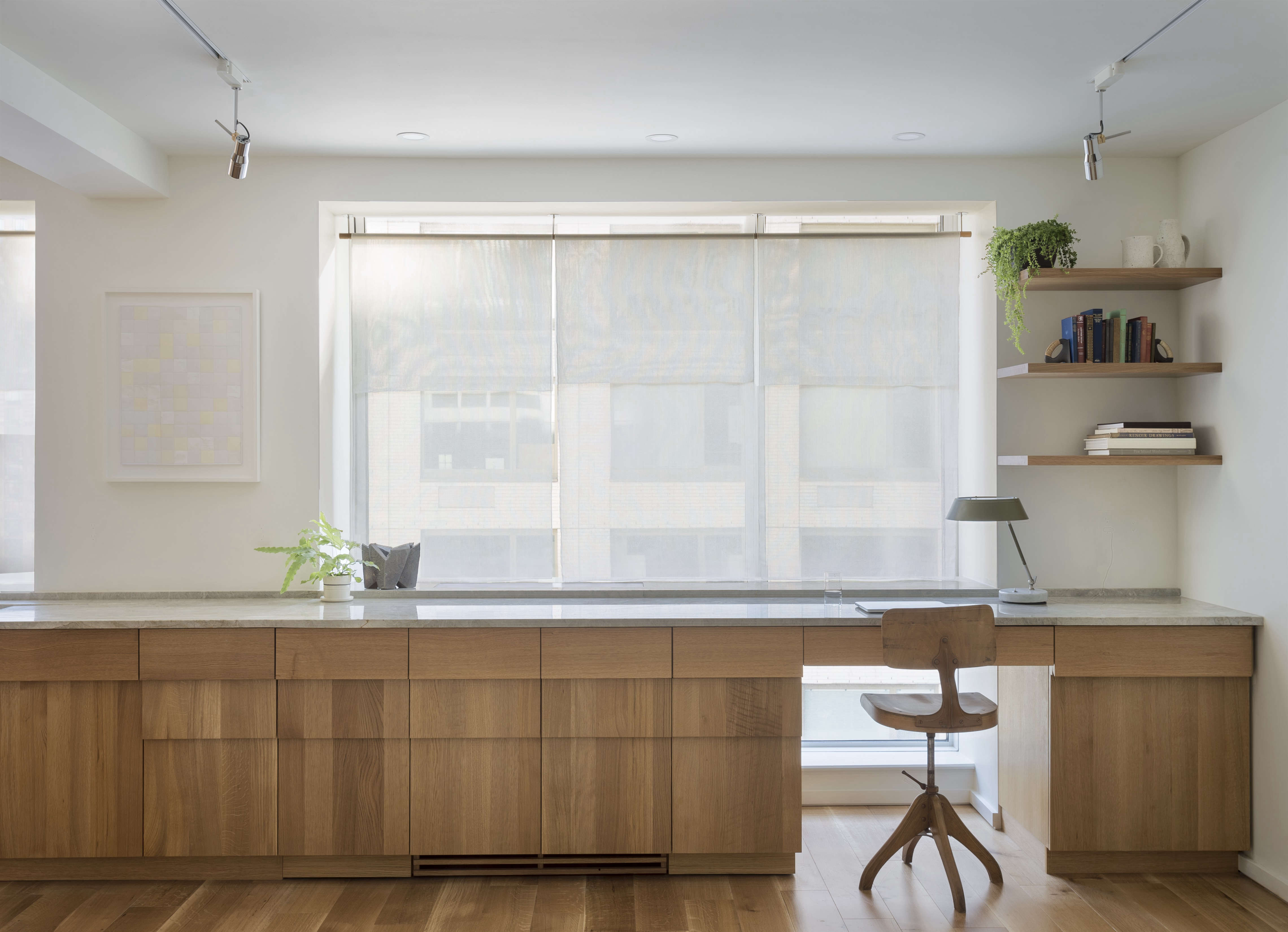 new york apartment home office with custom stepped oak cabinets, a design by wo 18