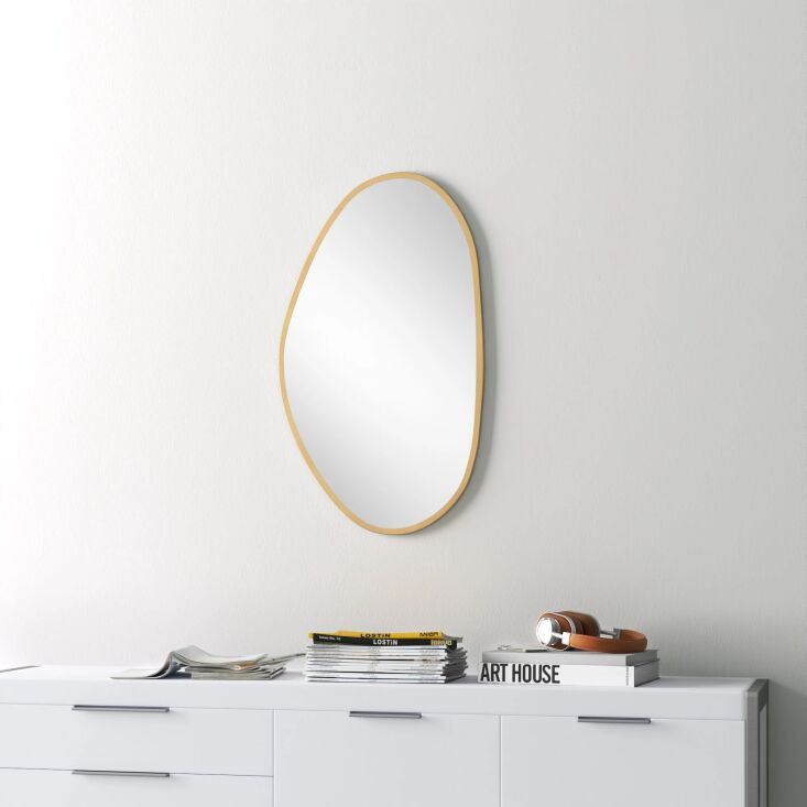 the nils irregular metal wall mirror is \$\2\1\2.99 from all modern. 22