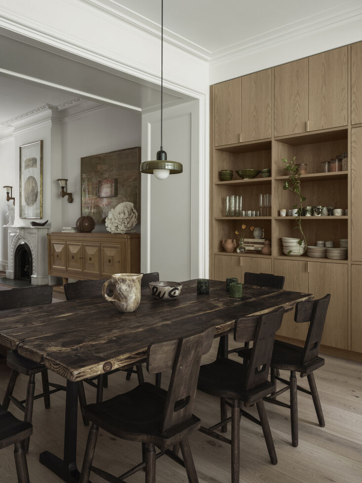 the open dining area is demarcated by a slightly lower, more intimate ceiling.  22