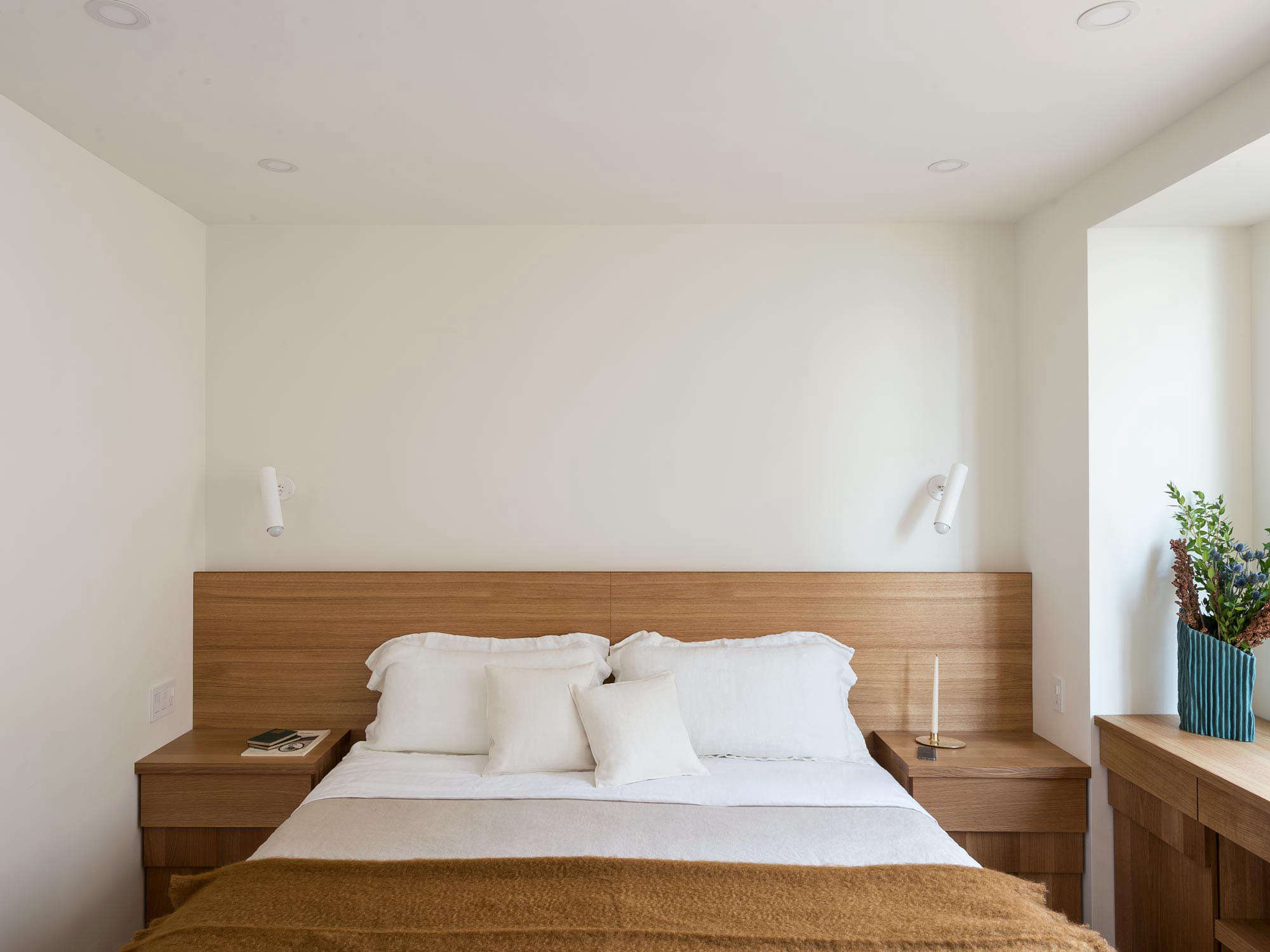 workstead design bedroom with custom oak headboard and built in bedside tables 26