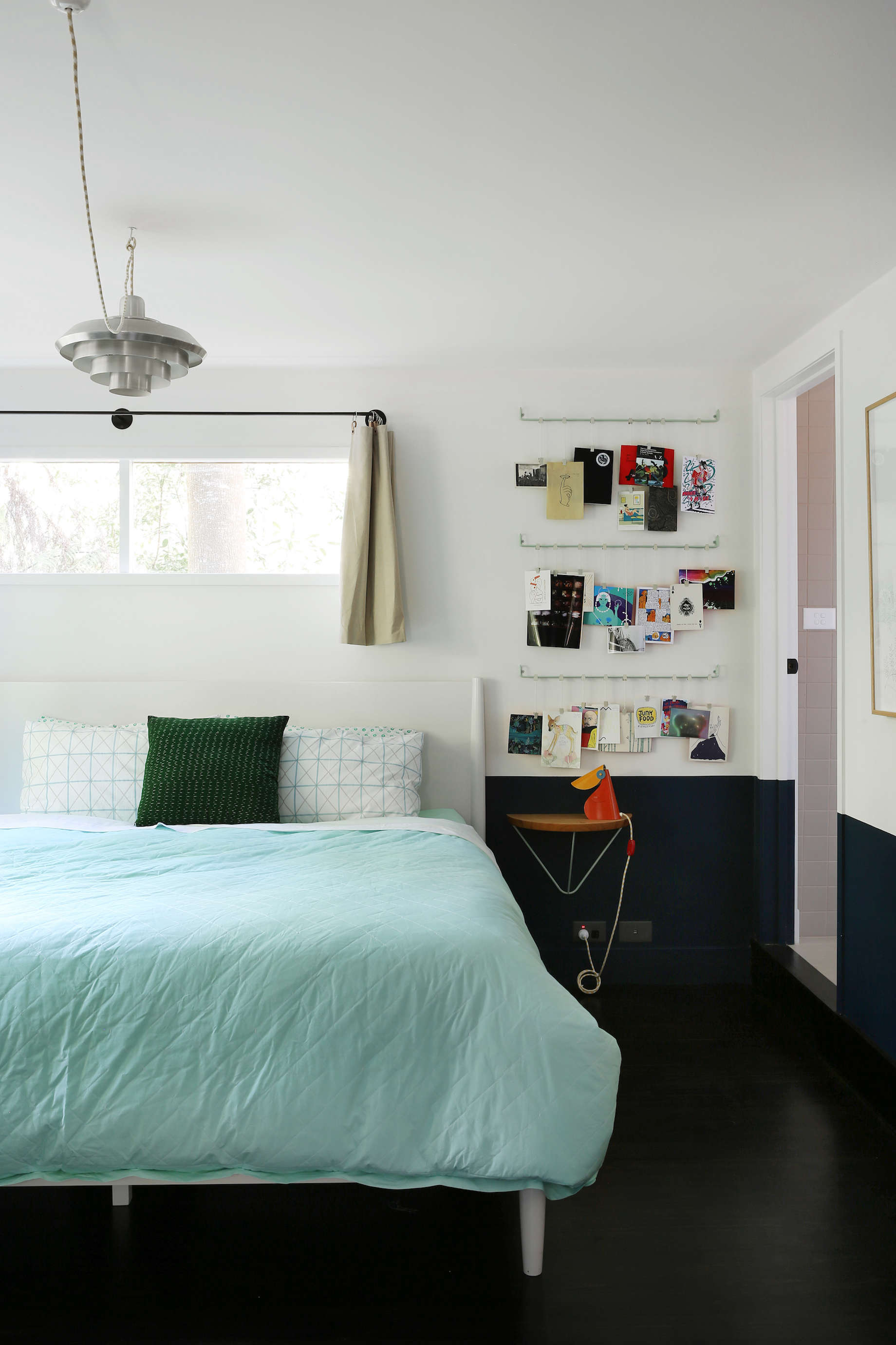 guest room with hanging card rack at jackie winter gardens, a guesthouse and ar 24