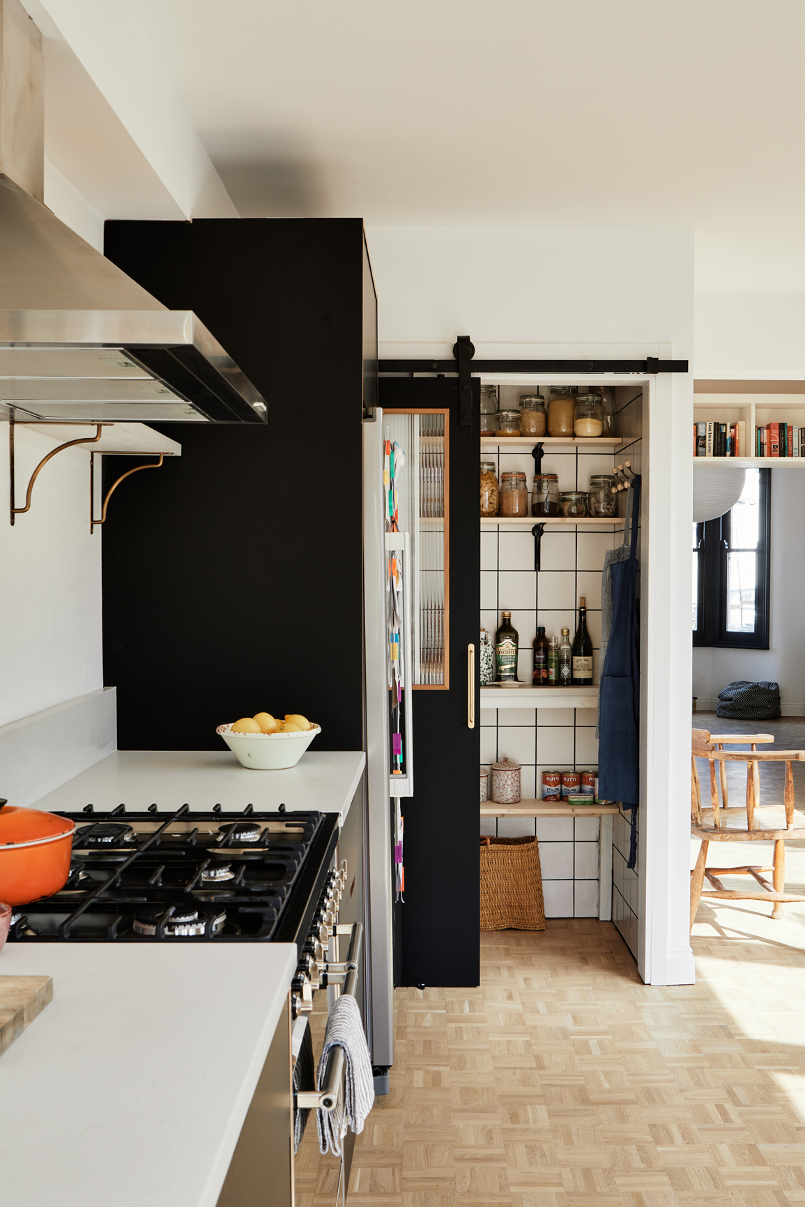 a ribbed window offers a glimpse into the pantry—but doesn\2\17;t requ 17