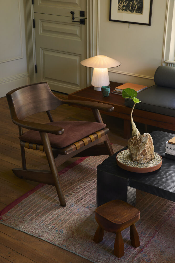 both the black walnut armchair (inspired by a traditional captain\2\17;s 19